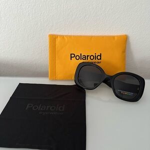 Polaroid Sunglasses black, With yellow case and cleaning cloth, New without tags